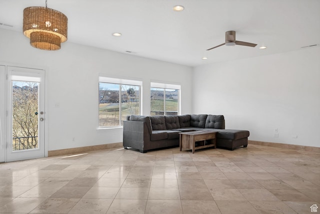 2261 S Tonaquint Dr Unit 8, St George, UT 84770 - living room with light tile patterned floors and ceiling fan