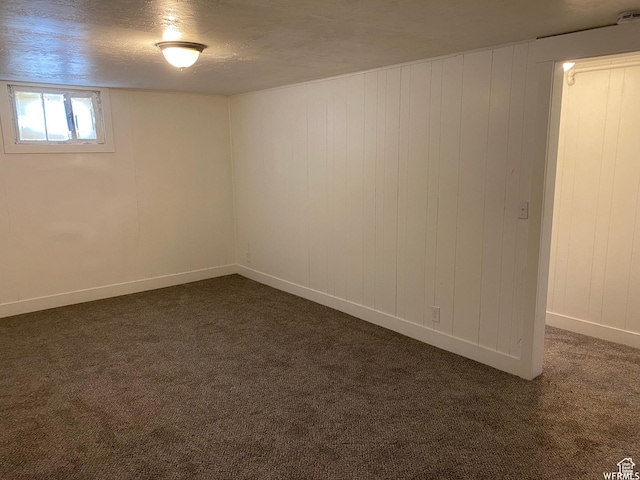 230 N 3rd St, Tooele, UT 84074 - unfurnished room with a textured ceiling and dark carpet