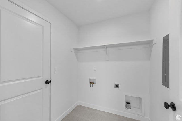 2869 S Ritter Row W Unit 54, West Valley City, UT 84128 - laundry room with hookup for a washing machine, laundry area, baseboards, electric panel, and electric dryer hookup