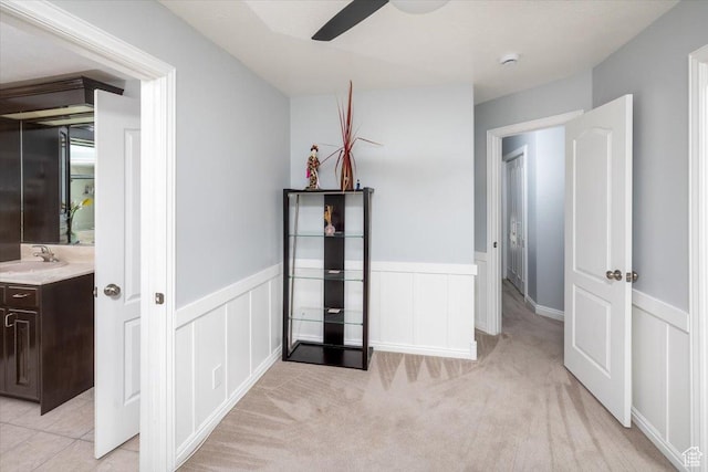 939 E Summit Dr N, Smithfield, UT 84335 - hallway featuring sink and light carpet