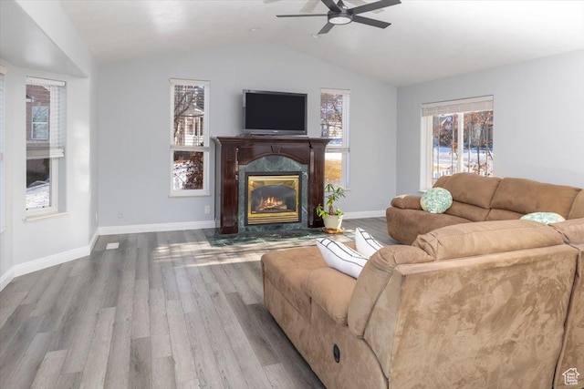 939 E Summit Dr N, Smithfield, UT 84335 - living room featuring hardwood / wood-style flooring, ceiling fan, a high end fireplace, and vaulted ceiling
