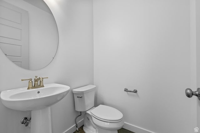 bathroom featuring toilet