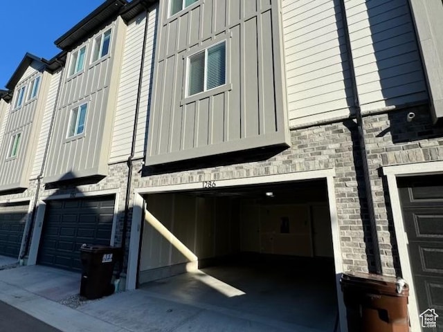 view of side of property featuring a garage