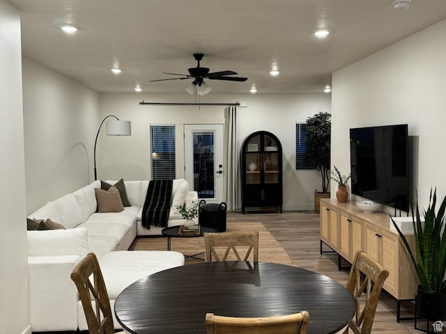 interior space featuring recessed lighting, baseboards, light wood-style floors, and ceiling fan