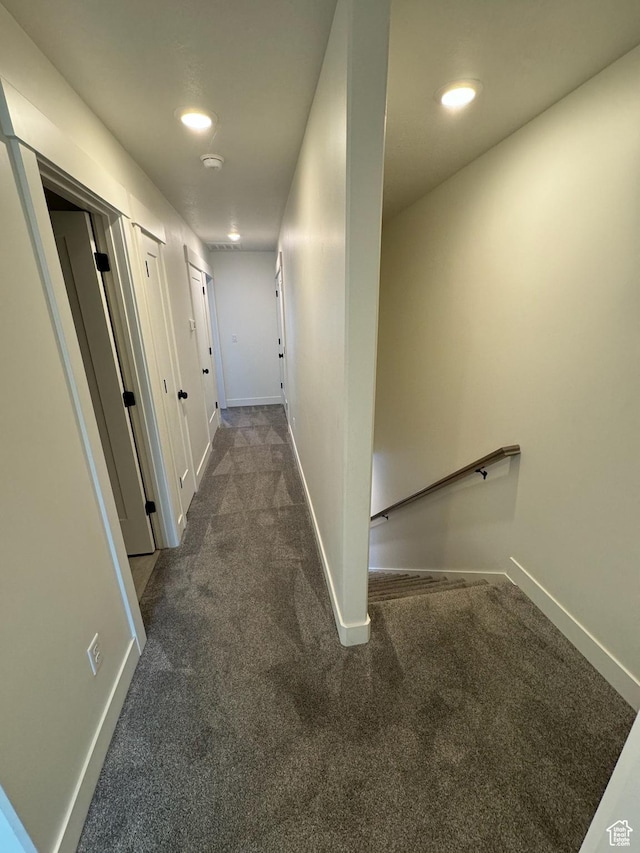 corridor featuring recessed lighting, baseboards, and carpet floors
