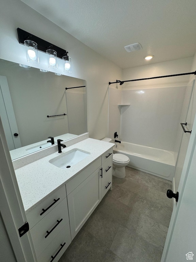 bathroom featuring vanity, visible vents,  shower combination, a textured ceiling, and toilet