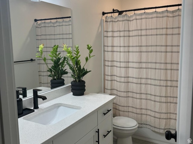 full bathroom with toilet, vanity, and shower / bathtub combination with curtain