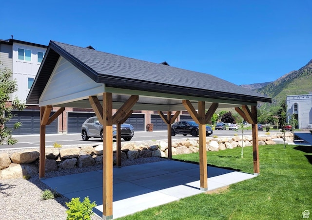 view of patio / terrace featuring a mountain view