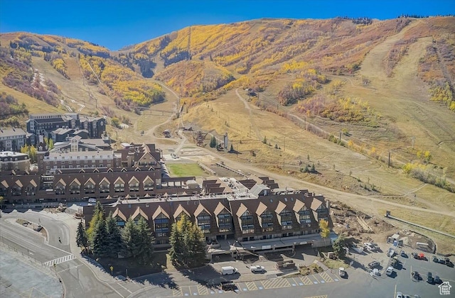 drone / aerial view featuring a mountain view
