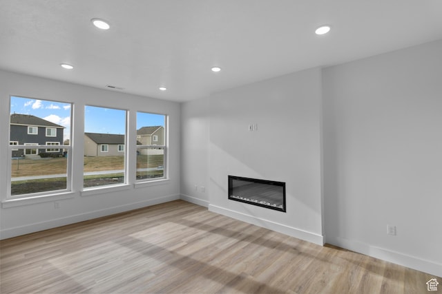 550 N 735 W, Smithfield, UT 84335 - unfurnished living room with light wood-type flooring