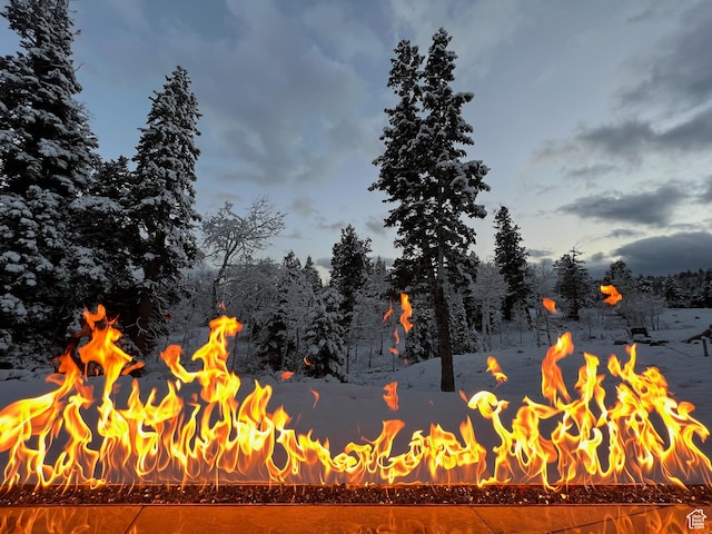exterior details with a fire pit