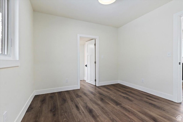 632 N Pugsley St, Salt Lake City, UT 84103 - spare room featuring dark wood-type flooring