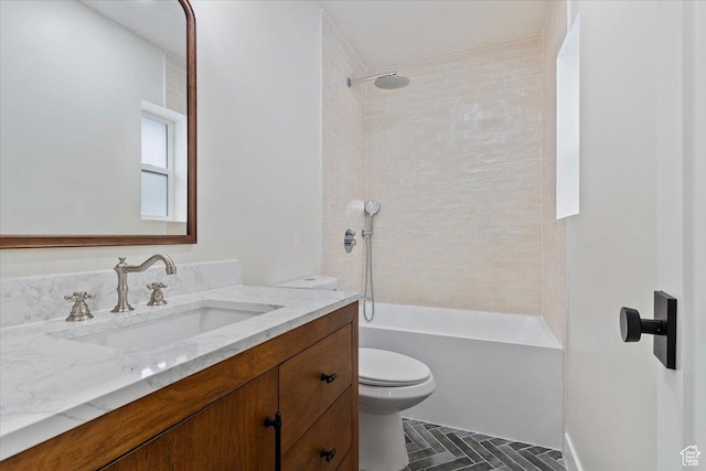 632 N Pugsley St, Salt Lake City, UT 84103 - full bathroom featuring vanity, tiled shower / bath combo, and toilet