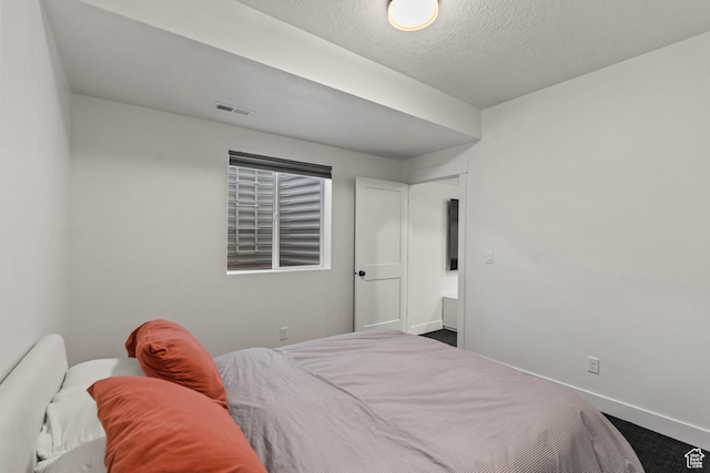 6850 Mountain Maple Dr Unit 14, Park City, UT 84098 - bedroom featuring a textured ceiling