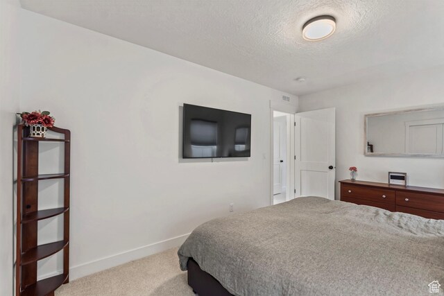 6850 Mountain Maple Dr Unit 14, Park City, UT 84098 - carpeted bedroom with a textured ceiling