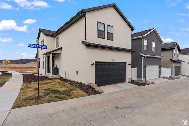 6850 Mountain Maple Dr Unit 14, Park City, UT 84098 - view of property exterior featuring a mountain view and a garage