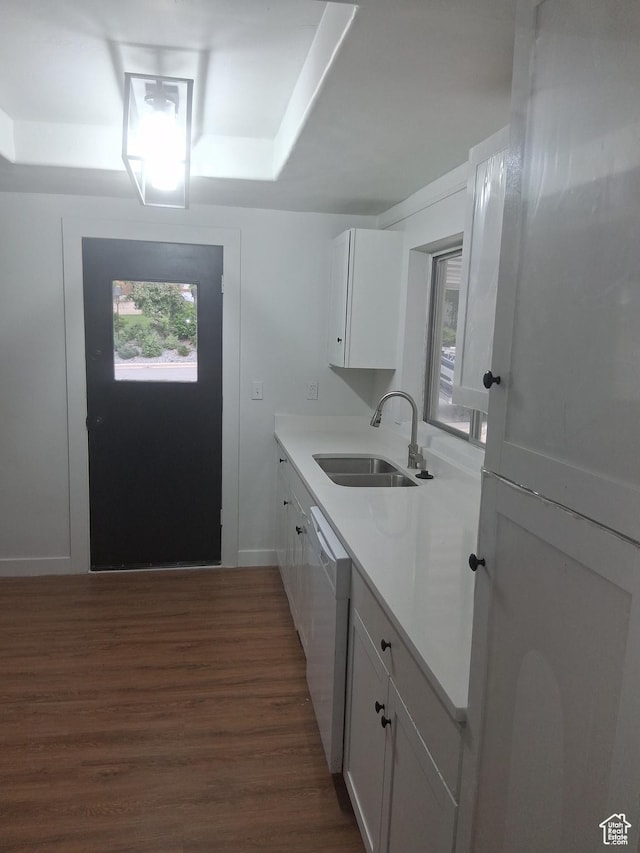 541 41st St, South Ogden, UT 84403 - kitchen with a sink, white dishwasher, white cabinetry, dark wood finished floors, and a tray ceiling
