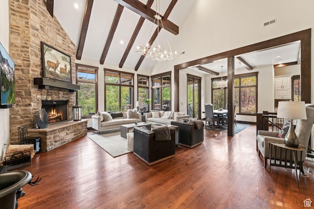 8670 Ranch Club Ct, Park City, UT 84098 - living room with dark hardwood / wood-style flooring, a notable chandelier, a fireplace, and high vaulted ceiling