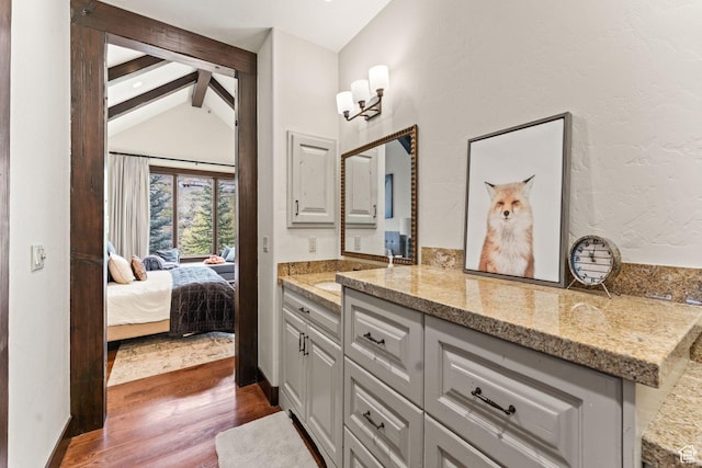 8670 Ranch Club Ct, Park City, UT 84098 - bathroom featuring wood-type flooring, vanity, and vaulted ceiling with beams