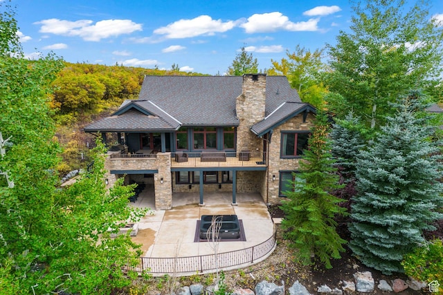 8670 Ranch Club Ct, Park City, UT 84098 - rear view of property featuring a balcony and a patio area