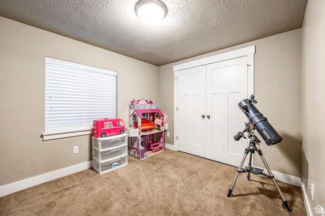7104 S Cadens Cv, Cottonwood Heights, UT 84121 - rec room featuring light carpet and a textured ceiling