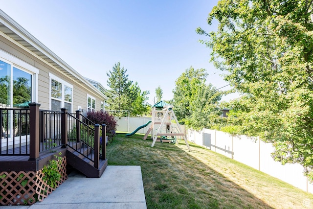7104 S Cadens Cv, Cottonwood Heights, UT 84121 - view of yard with a playground and a wooden deck