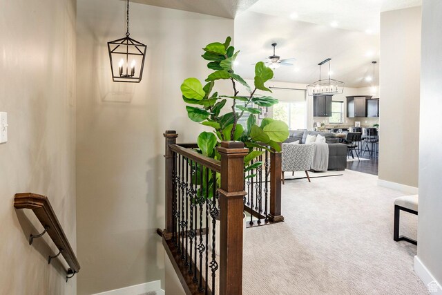 7104 S Cadens Cv, Cottonwood Heights, UT 84121 - stairs with a chandelier, baseboards, carpet flooring, and a ceiling fan