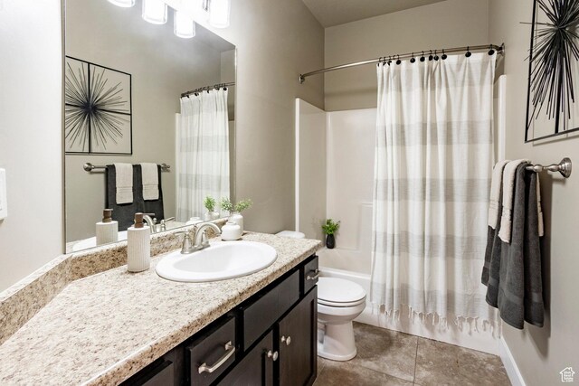 7104 S Cadens Cv, Cottonwood Heights, UT 84121 - bathroom with toilet, vanity, shower / bath combo with shower curtain, and tile patterned floors
