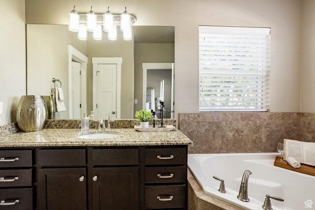 7104 S Cadens Cv, Cottonwood Heights, UT 84121 - bathroom featuring vanity and a bath