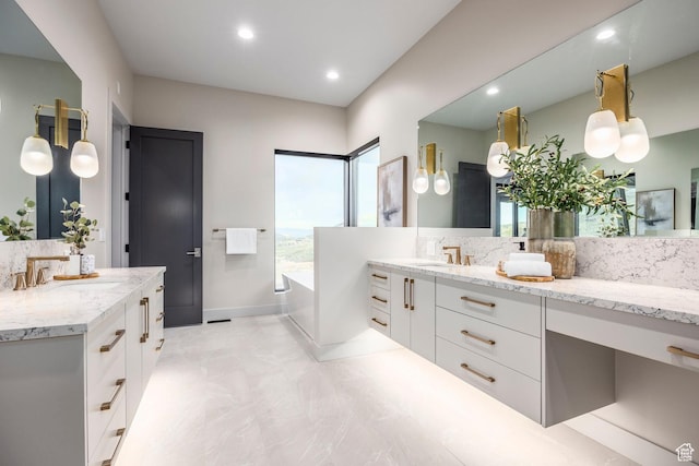 1817 W Skyridge Dr, Heber City, UT 84032 - full bath with two vanities, a bath, recessed lighting, and baseboards