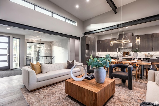 1817 W Skyridge Dr, Heber City, UT 84032 - living room featuring a chandelier, wood finished floors, plenty of natural light, high vaulted ceiling, and recessed lighting