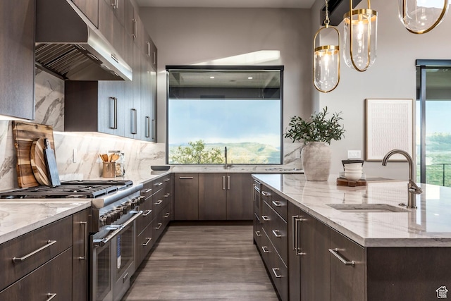 1817 W Skyridge Dr, Heber City, UT 84032 - kitchen featuring under cabinet range hood, a sink, stainless steel stove, and dark brown cabinetry