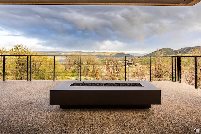 1817 W Skyridge Dr, Heber City, UT 84032 - view of patio / terrace featuring a fire pit and a mountain view