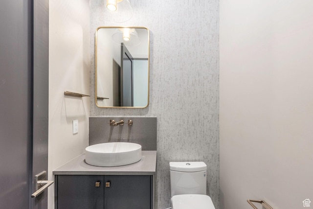 bathroom with vanity and toilet