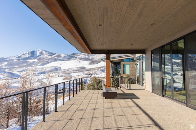 1817 W Skyridge Dr, Heber City, UT 84032 - snow covered patio featuring a mountain view and a balcony