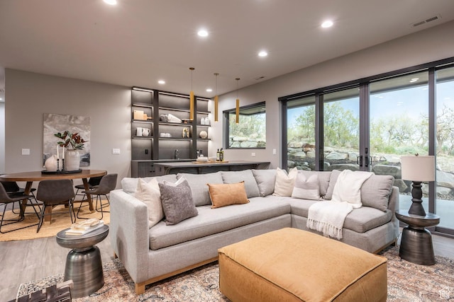 1817 W Skyridge Dr, Heber City, UT 84032 - living area featuring light wood-style floors, recessed lighting, and wet bar