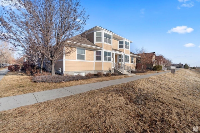 view of front of property with a front lawn
