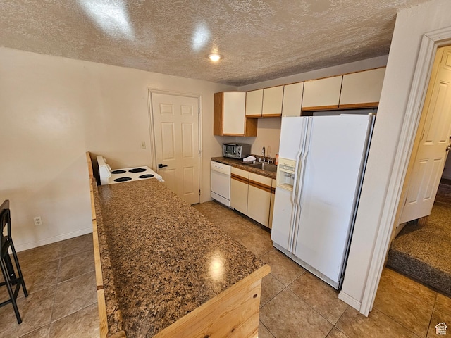 11905 E 24560 N, Fairview, UT 84629 - kitchen featuring white appliances, sink, and a textured ceiling