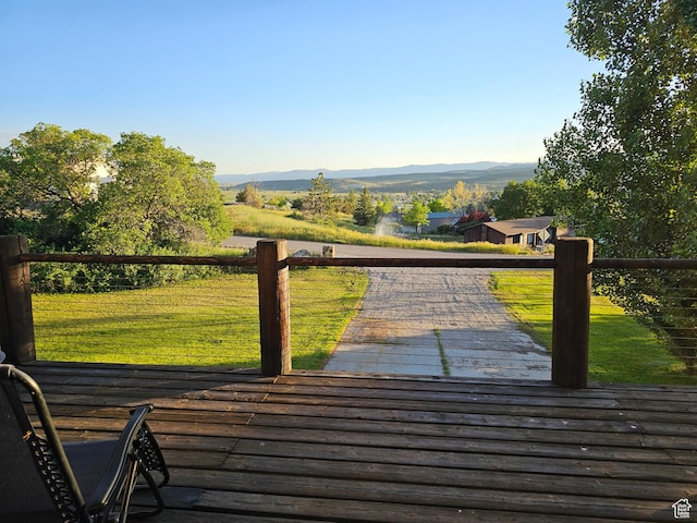 11905 E 24560 N, Fairview, UT 84629 - surrounding community with a lawn and a deck with mountain view