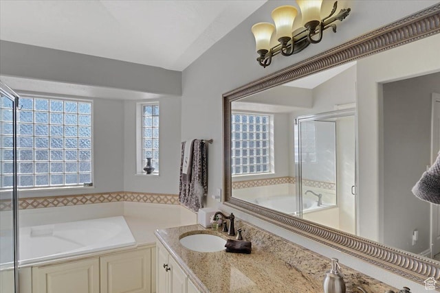 818 Summit Dr, Smithfield, UT 84335 - full bathroom with a bath, a shower stall, and vanity
