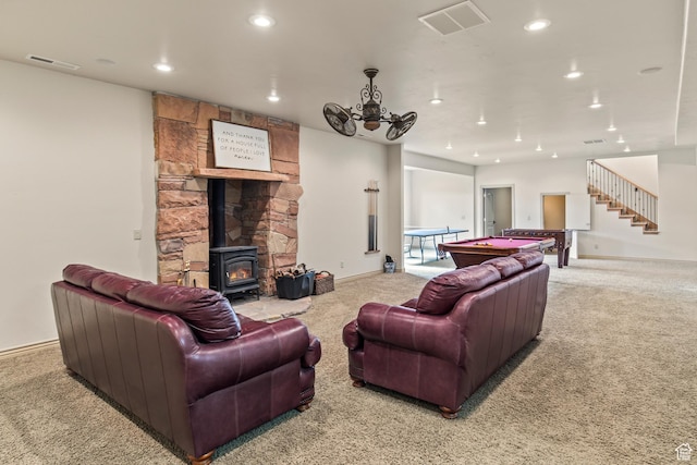 655 W 85 S, Glenwood, UT 84730 - living area featuring light carpet, a wood stove, recessed lighting, stairway, and pool table
