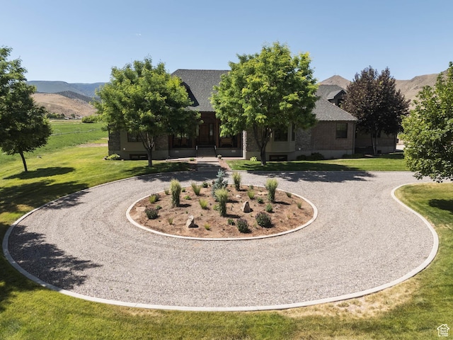 655 W 85 S, Glenwood, UT 84730 - view of front facade with curved driveway, a front yard, and a mountain view