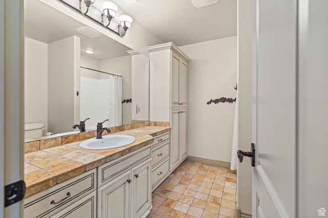 655 W 85 S, Glenwood, UT 84730 - full bath with vanity, stone finish flooring, and curtained shower