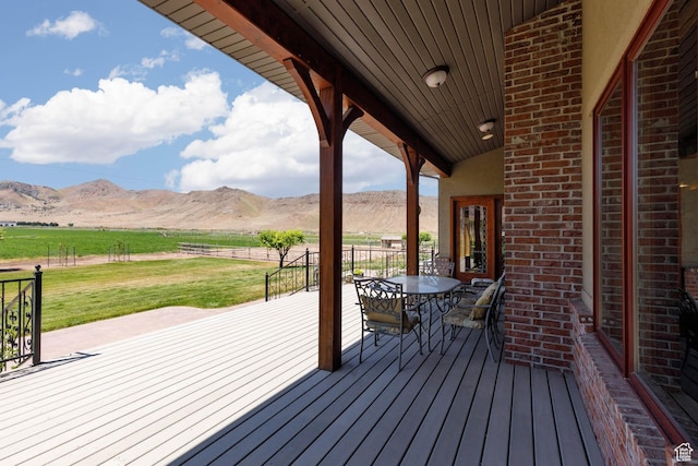 655 W 85 S, Glenwood, UT 84730 - deck with a mountain view, a lawn, a rural view, and outdoor dining space