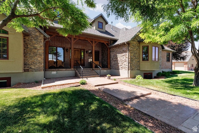 655 W 85 S, Glenwood, UT 84730 - view of front of property with stone siding, a porch, a front yard, and roof with shingles