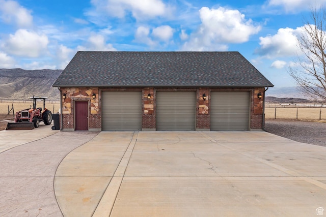 655 W 85 S, Glenwood, UT 84730 - garage featuring a mountain view and driveway