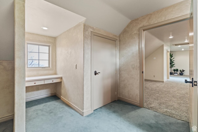 655 W 85 S, Glenwood, UT 84730 - hall with carpet floors, a desk, and vaulted ceiling
