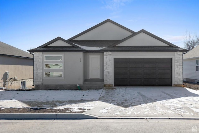 single story home featuring a garage