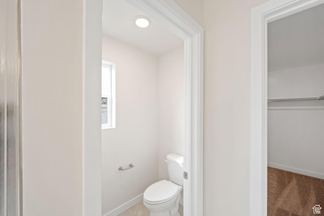 bathroom featuring toilet