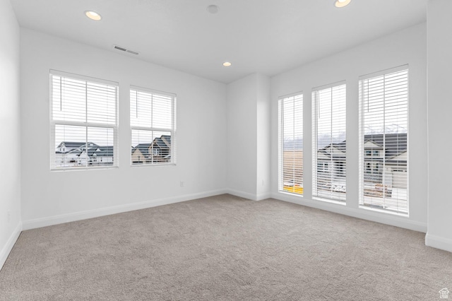 view of carpeted spare room